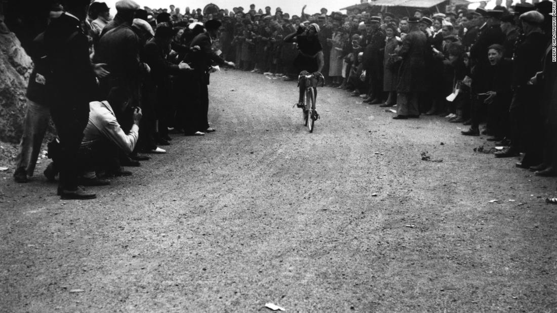 The Tour de France is a huge event for spectators, who come out to cheer on cyclists moving at high speeds. Legendary war photographer Robert Capa captured the race in 1939.