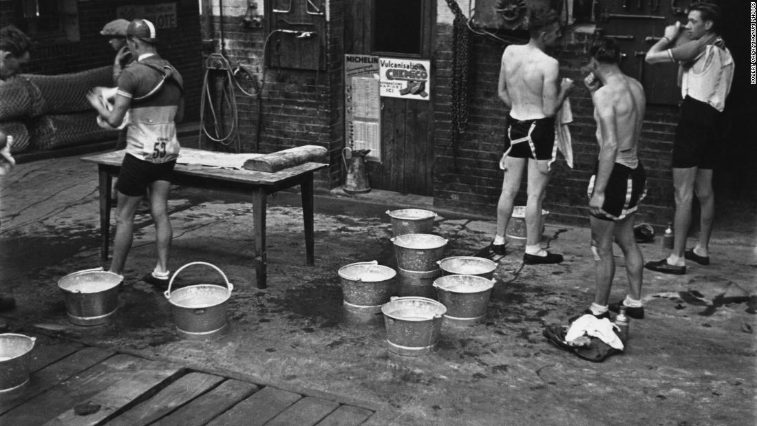 Nowadays, cyclists are on teams funded by major corporate sponsors. They have doctors, dietitians and other specialists on staff catering to their every need. The situation was a little more austere in the &#39;30s. Here, the cyclists stop for the day to rest, wash and clean up.