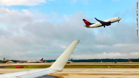 A Delta pilot was removed from a fully boarded plane and arrested on suspicion of being intoxicated