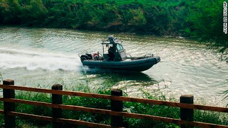 A U.S. Border Patrol boat navigates the Rio Grande near where the bodies of Oscar Alberto Martínez Ramírez and his daughter Valeria were found in Matamoros, Mexico, on June 24. 