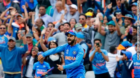 Kohli celebrates during India&#39;s World Cup victory over Australia.