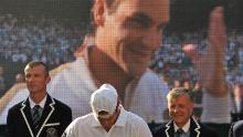 Bucuria victoriei și agonia înfrângerii din finala masculină din Wimbledon din 2009 sunt rezumate în această fotografie. Roger Federer a învins-o pe Andy Roddick în cinci seturi. 