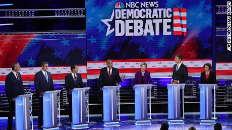 Democratic presidential candidates New York City Mayor Bill De Blasio (L-R), Rep. Tim Ryan (D-OH), former housing secretary Julian Castro, Sen. Cory Booker (D-NJ), Sen. Elizabeth Warren (D-MA), former Texas congressman Beto O&#39;Rourke and Sen. Amy Klobuchar (D-MN) take part in the first night of the Democratic presidential debate on June 26, 2019 in Miami, Florida.  A field of 20 Democratic presidential candidates was split into two groups of 10 for the first debate of the 2020 election, taking place over two nights at Knight Concert Hall of the Adrienne Arsht Center for the Performing Arts of Miami-Dade County, hosted by NBC News, MSNBC, and Telemundo. 