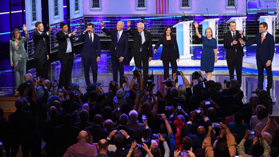 Ten presidential candidates take the stage for a Democratic debate in Miami on Thursday, June 27. The candidates, from left, are author Marianne Williamson; former Colorado Gov. John Hickenlooper; businessman Andrew Yang; South Bend, Indiana, Mayor Pete Buttigieg; former Vice President Joe Biden; US Sen. Bernie Sanders; US Sen. Kamala Harris; US Sen. Kirsten Gillibrand; US Sen. Michael Bennet; and US Rep. Eric Swalwell.