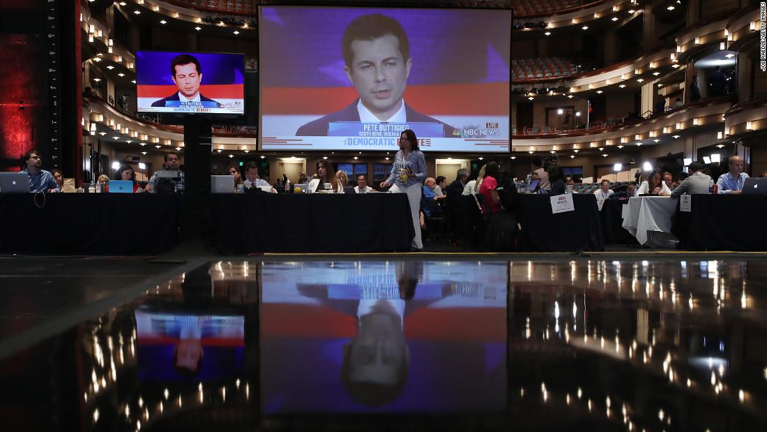 Buttigieg is seen on a monitor inside the spin room where many members of the media were set up. Buttigieg became South Bend&#39;s mayor in 2011 when he was 29 years old. From 2009 to 2017, he was an intelligence officer in the Navy Reserve, and he was deployed to the war in Afghanistan in 2014.