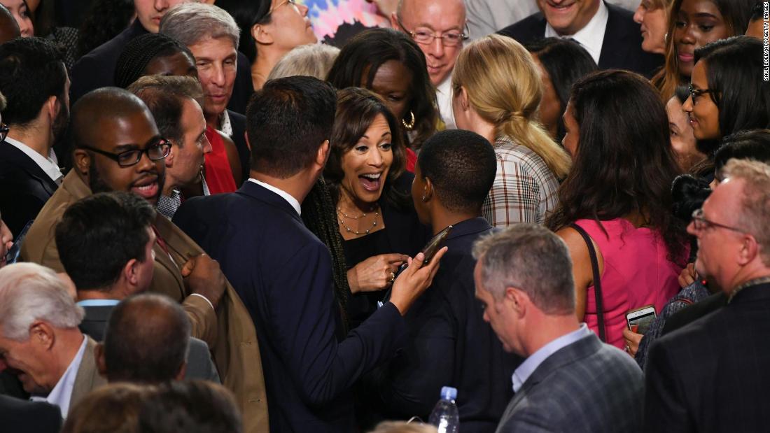 Harris speaks with guests after Thursday&#39;s debate.