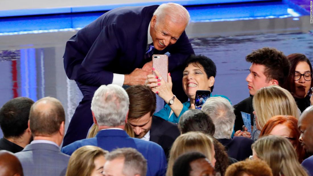 Biden poses for a selfie after the debate.