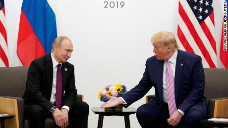 Russia&#39;s President Vladimir Putin and US President Donald Trump talk during a bilateral meeting at the G20 leaders summit in Osaka, Japan, June 28, 2019. 