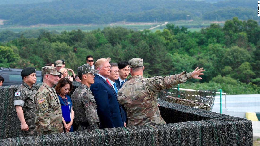 Trump views North Korea from from Observation Post Ouellette at Camp Bonifas in South Korea on Sunday, June 30.