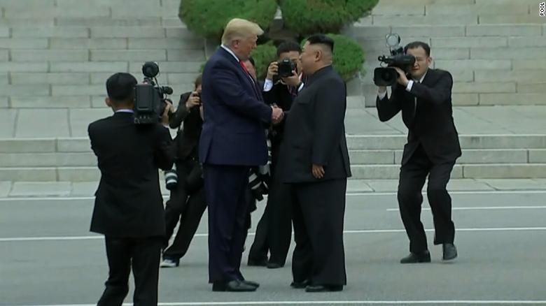 Trump shakes hands with Kim Jong Un at the DMZ