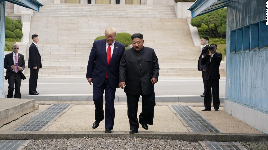 After shaking hands and patting each other's backs while inside North Korean territory, the leaders walked together back across the line into South Korea.