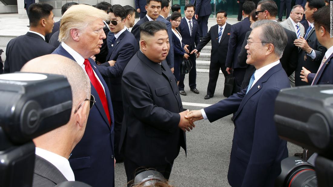 South Korean President Moon Jae-in meets with North Korean leader Kim Jong Un, alongside President Trump at the truce village of Panmunjom in the Korean Demilitarized Zone, on Sunday, June 30.