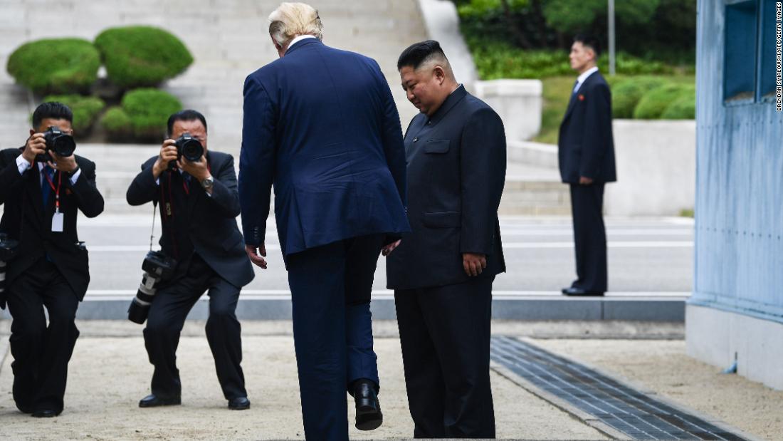 Trump makes history as he steps onto the northern side of the Military Demarcation Line that divides North and South Korea on June 30. Kim looks on as Trump becomes the first sitting US President to walk into South Korea.