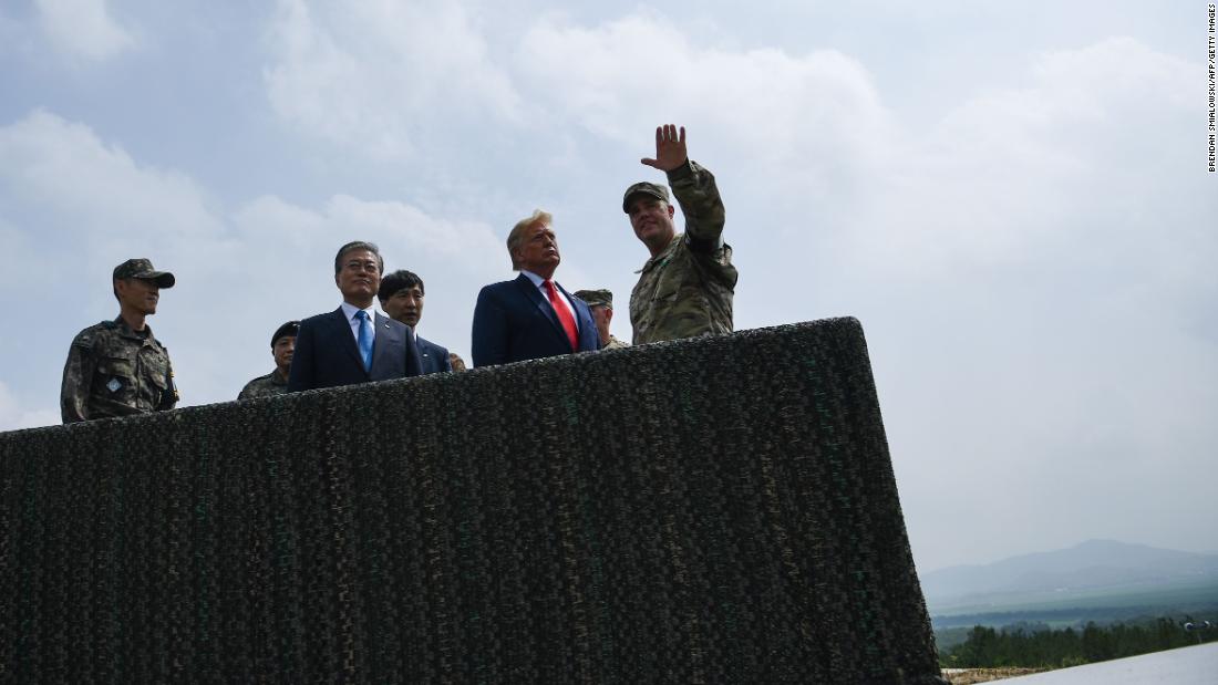 Trump and Moon visit an observation post in the Joint Security Area at Panmunjom in the Demilitarized Zone separating North and South Korea on June 30.