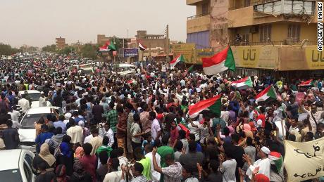 Sudanese protestors chant slogans demanding civilian rule during a rally in Khartoum&#39;s southern al-Sahafa district.