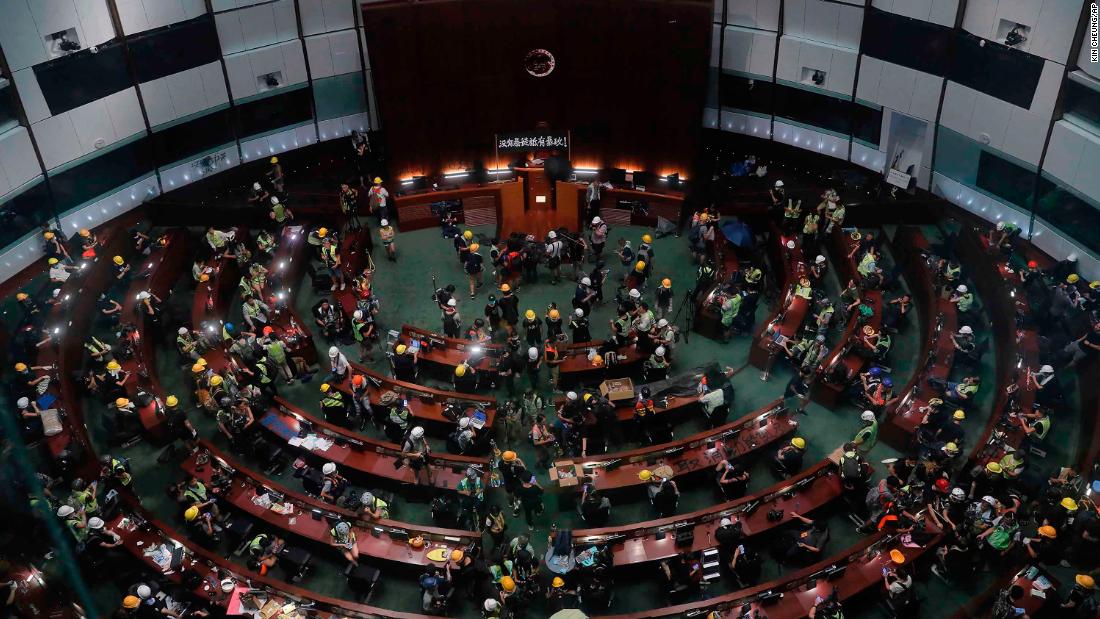 The meeting hall of the Legislative Council is taken over by demonstrators on July 1.