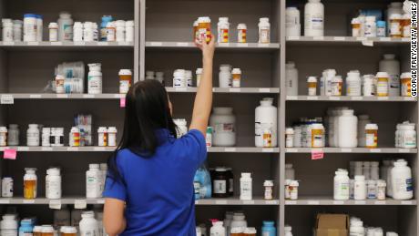 MIDVALE, UT - SEPTEMBER 10: A pharmacy technician grabs a bottle of drugs off a shelve at the central pharmacy of Intermountain Heathcare on September 10, 2018 in Midvale, Utah. IHC along with other hospitals and philanthropies are launching a nonprofit generic drug company called &quot;Civica Rx&quot; to help reduce cost and shortages of generic drugs.  (Photo by George Frey/Getty Images)