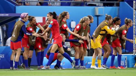 The US team celebrates after Alex Morgan&#39;s goal.