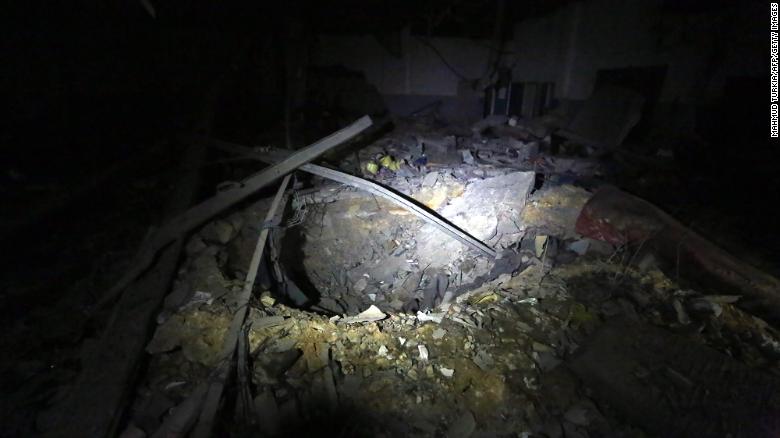 The point of impact of a bomb is seen inside Tajoura Detention Center after an airstrike killed nearly 40, east of Tripoli on early July 3.