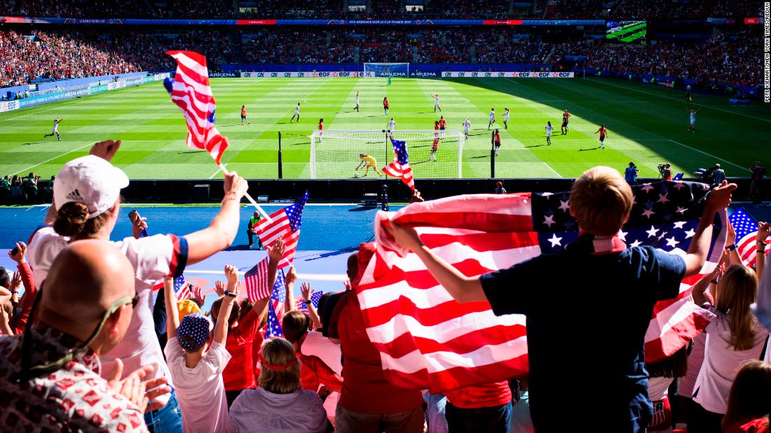 US fans celebrate a goal in the Americans' 3-0 victory over Chile. Thousands of US fans made the trip to France.