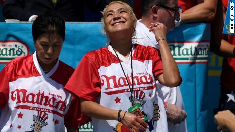 Miki Sudo, right, ate 31 hot dogs to win the women&#39;s competition. (AP Photo/Sarah Stier)