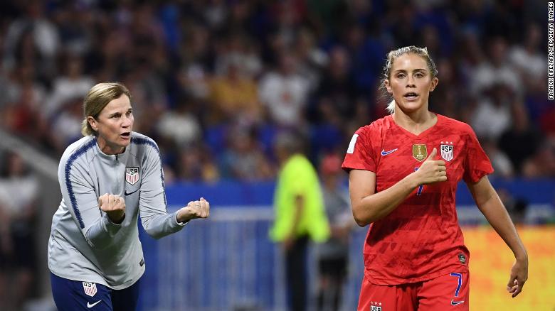 Ellis speaks to defender Abby Dahlkemper during the semi-final against England.