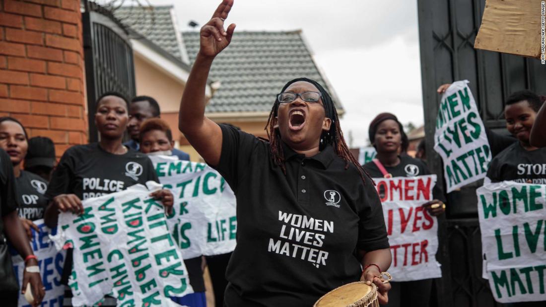 Stella Nyanzi, center, leads a protest over the handling of police investigations into murders and kidnappings of women in Kampala in June 2018.