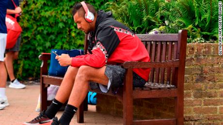 Nick Krygios relaxes ahead of practice at Wimbledon.