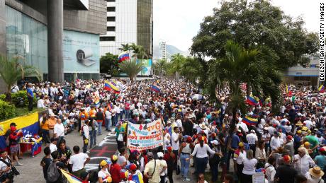 Venezuelans wave flags at a demonstration called by opposition leader Juan Guaido during the 208th anniversary of the Venezuelan Independence declaration on July 5.