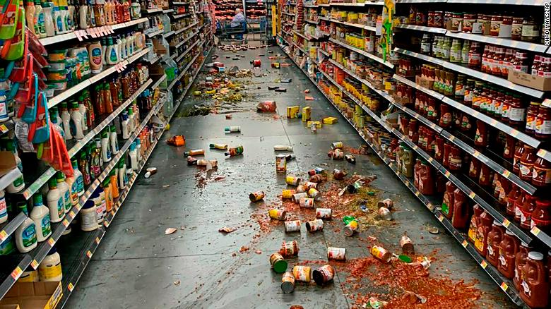 Food that fell from shelves litters the aisle at a Walmart in Yucca Valley, California, following the earthquake on Friday.