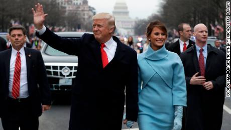 WASHINGTON, DC - JANUARY 20: U.S. President Donald Trump waves to supporters as he walks the parade route with first lady Melania Trump and son Barron Trump after being sworn in at the 58th Presidential Inauguration January 20, 2017 in Washington, D.C. Donald J. Trump was sworn in today as the 45th president of the United States (Photo by Evan Vucci - Pool/Getty Images)