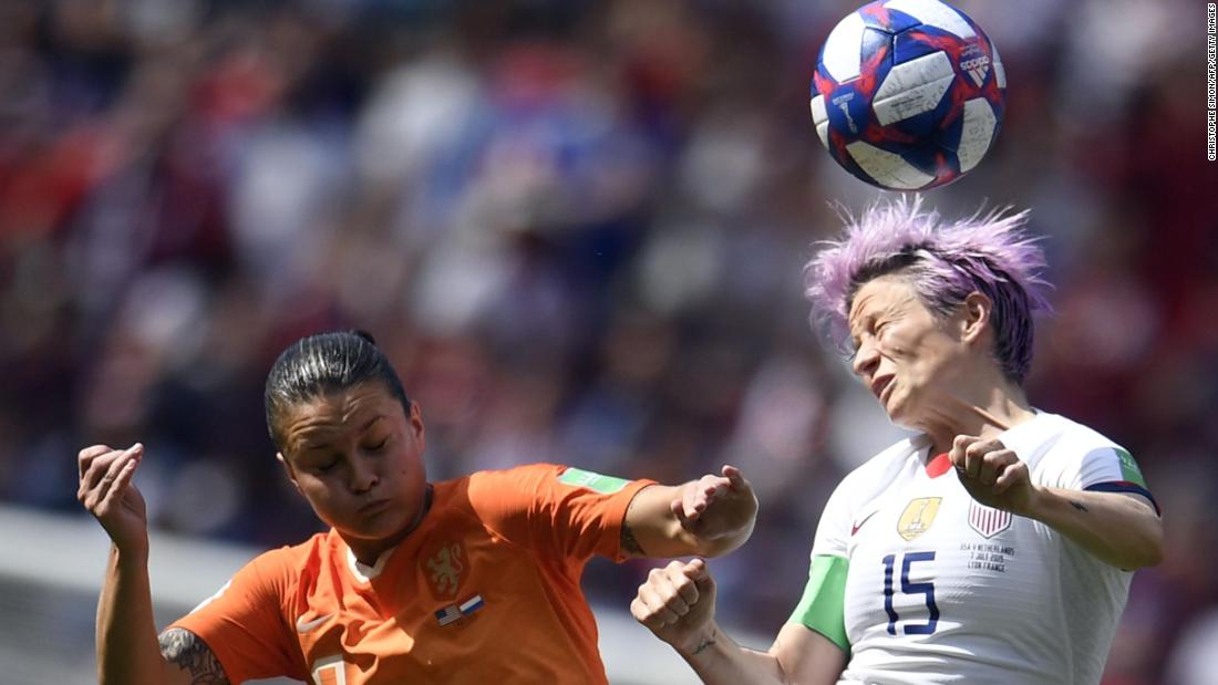 Rapinoe connects on a header.