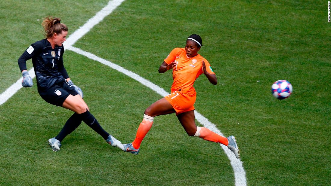 US goalkeeper Alyssa Naeher, left, clears the ball before Beerensteyn could get to it in the first half.