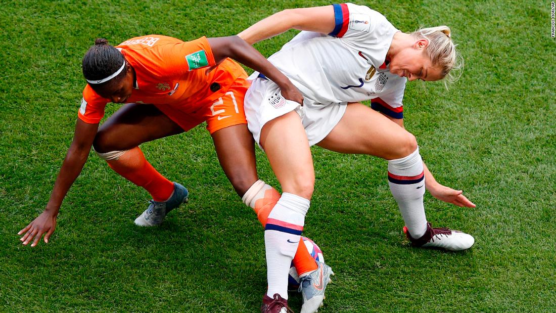 US defender Abby Dahlkemper battles Lineth Beerensteyn for the ball.