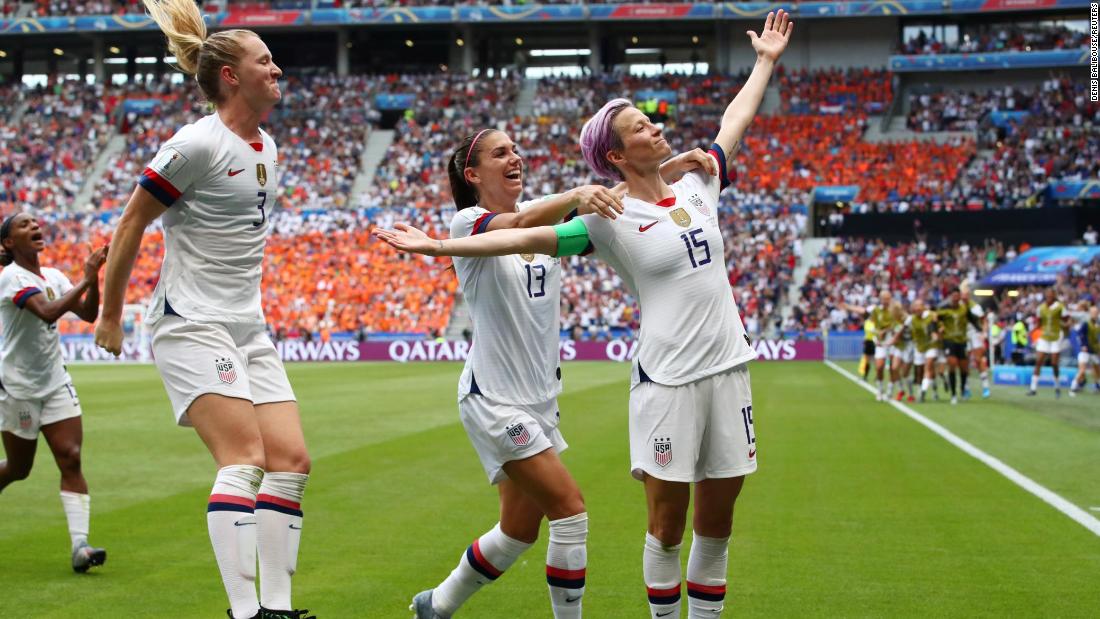 US players celebrate after Rapinoe scored the opening goal off a penalty in the 61st minute.