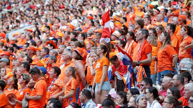 Dutch fans watch the match from inside the stadium.