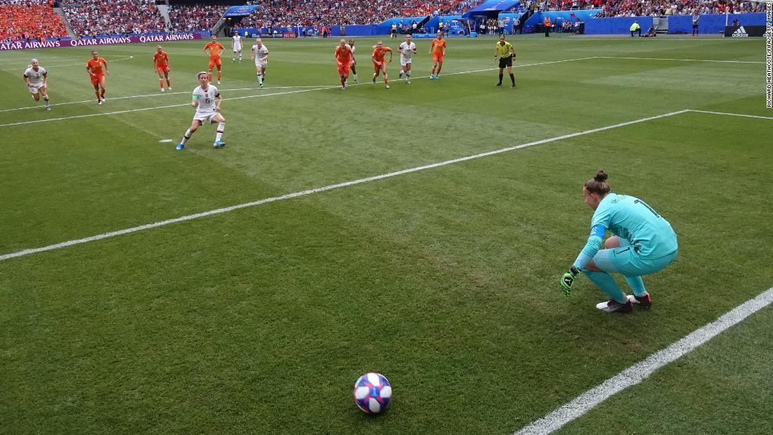 Rapinoe slots home her penalty past Sari van Veenendaal.