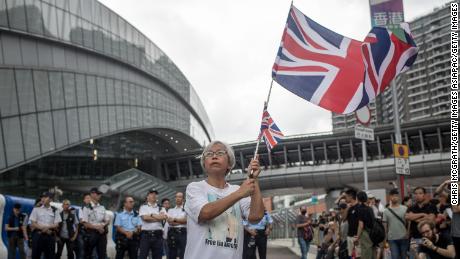 A protester waves a UK flag during a Hong Kong protest on July 7, 2019.