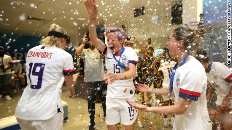 Megan Rapinoe of the USA celebrates in the dressing room following her team&#39;s victory in the 2019 FIFA Women&#39;s World Cup France Final.