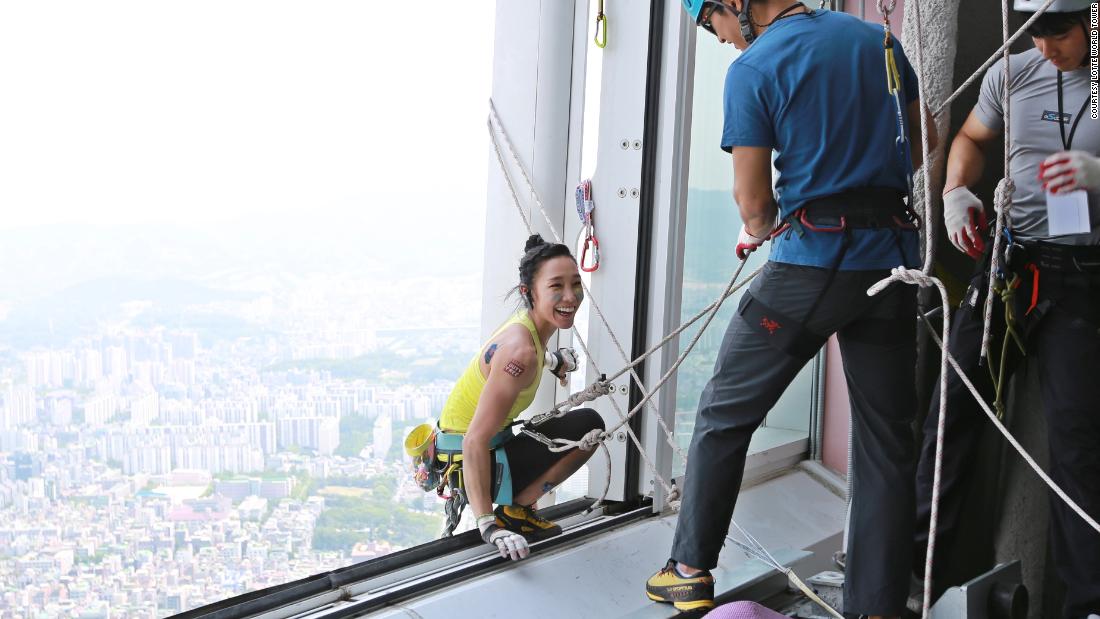 Kim changing rope lines as she climbs the Lotte World Tower, Seoul in 2017. When she reached the top she was met by her husband and her brother. &quot;(They) expected to see me exhausted,&quot; she said, &quot;but I was just too happy.&quot;