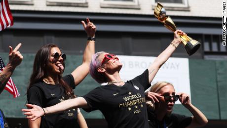 NEW YORK, NEW YORK - JULY 10:  Alex Morgan, Megan Rapinoe, and Allie Long celebrate during the U.S. Women&#39;s National Soccer Team Victory Parade and City Hall Ceremony on July 10, 2019 in New York City. (Photo by Al Bello/Getty Images)