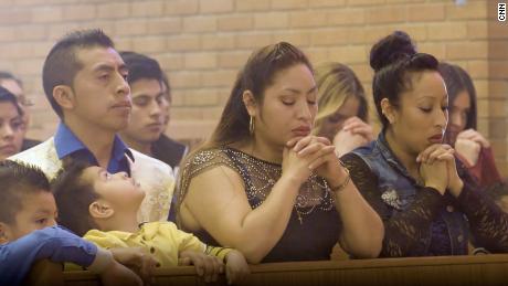 Parishoners attend a service at St. Mary&#39;s Catholic Church. 