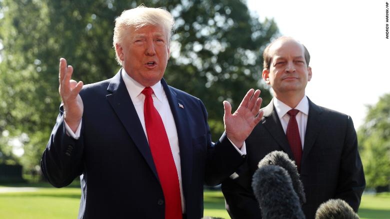 President Donald Trump speaks to members of the media with Secretary of Labor Alex Acosta on the South Lawn of the White House, Friday, July 12, 2019, before Trump boards Marine One for a short trip to Andrews Air Force Base, Md. and then on to Wisconsin. (AP Photo/Andrew Harnik)