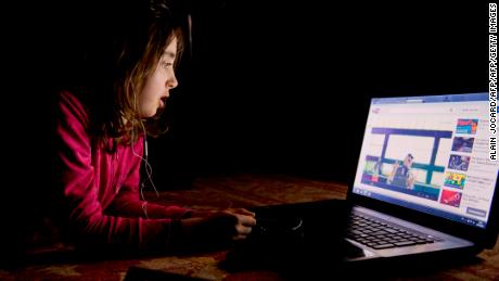 A girl watches a video on youtube on a computer on February 27, 2013 in Chisseaux near Tours, central France.  AFP PHOTO/ ALAIN JOCARD        (Photo credit should read ALAIN JOCARD/AFP/Getty Images)