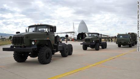 Military vehicles and equipment, including parts of the S-400 air defense systems, are unloaded from a Russian transport aircraft in Ankara on Friday, July 12, 2019.