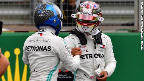 Lewis Hamilton congratulates Valtteri Bottas on his pole position.