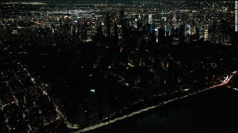 Seen from the air, a large section of Manhattan's Upper West Side and Midtown neighborhoods stand coated in darkness on Saturday, July 13.