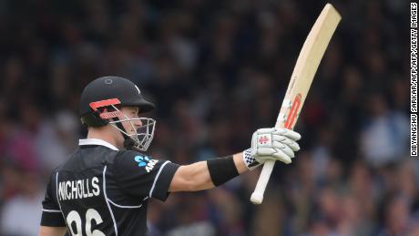 New Zealand's Henry Nicholls celebrates after scoring a half-century.