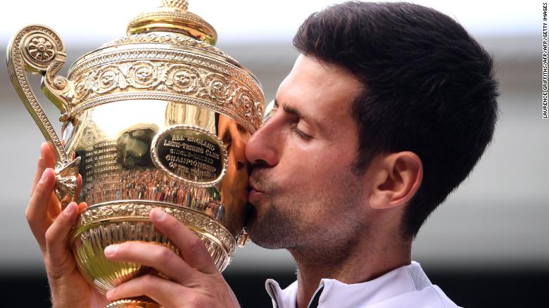 Serbia's Novak Djokovic kisses the winner's trophy after beating Roger Federer in a five-set epic final at Wimbledon last month.