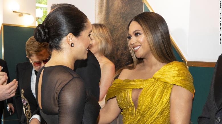 Prince Harry, Duke of Sussex (L) and Meghan, Duchess of Sussex (2nd L) meet Beyonce Knowles-Carter (C) and Jay-Z (R) at the European Premiere of Disney's "The Lion King."